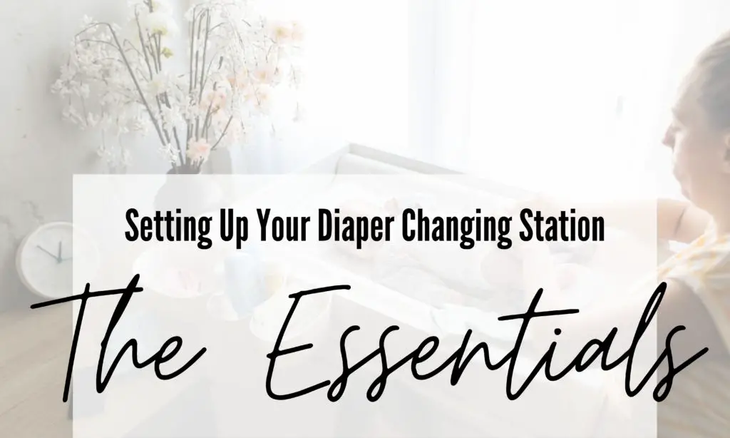 This image shows a mom with a baby on a baby changing table. It has black text that says "setting up your diaper changing station. The Essentials"