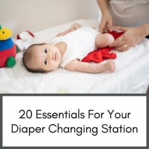 this image has a picture of a baby on a changing table. At the bottom of the image there is text that says "20 essentials for your diaper changing station"
